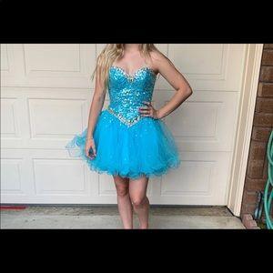 Couture dresses. Worn once.  Adjustable size